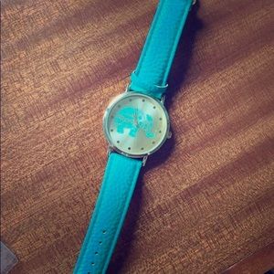 Turquoise watch with elephant face